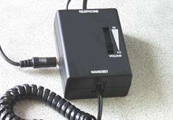 Handset and Headset In-Use Indicator Amplifier Control